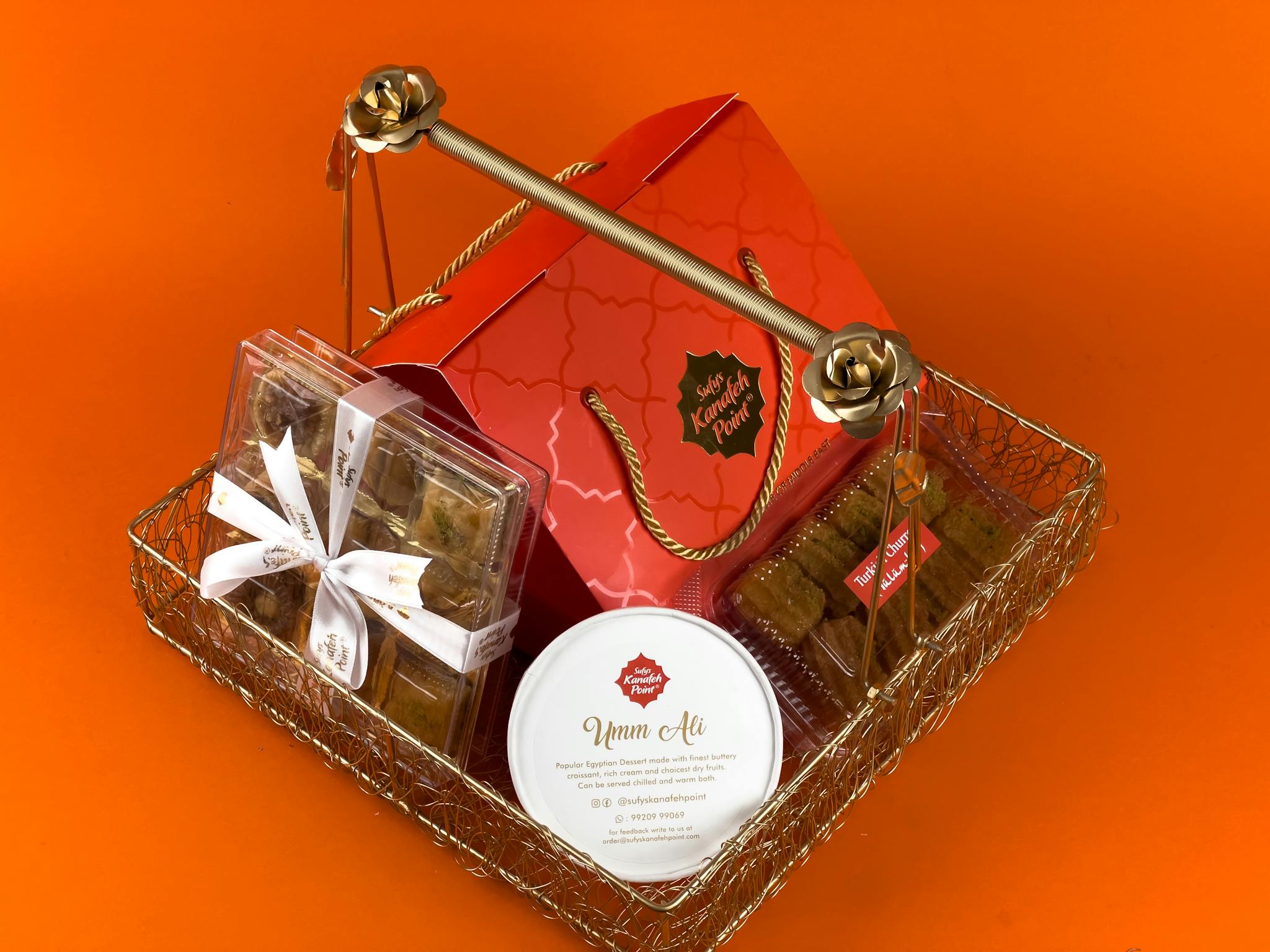 Luxurious gift basket with chocolates, sweets, and pralines, perfect for special occasions.