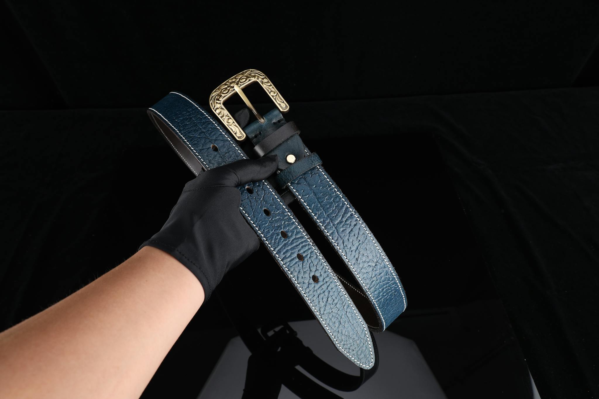Premium blue leather belt with a decorative buckle, ideal for gifts and fashion accessorizing.